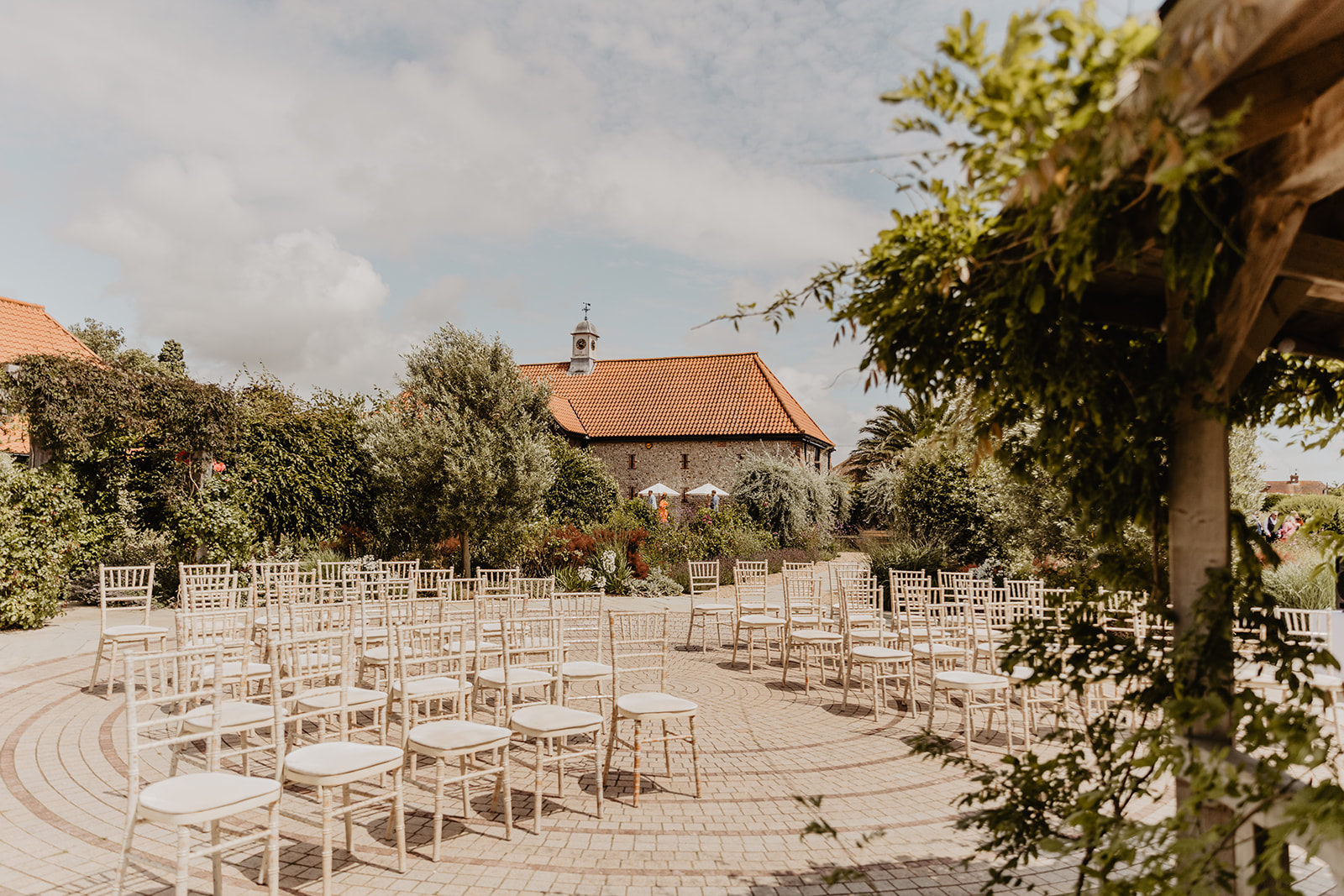 Outdoor ceremony at a Field Place Manor House Wedding in Worthing, Sussex. By Olive Joy Photography
