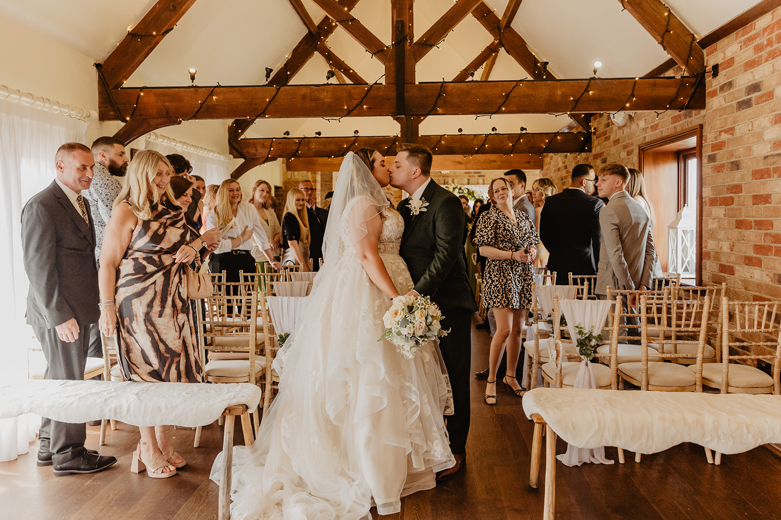 bride and groom at a Long Furlong Barn Wedding in Worthing, Sussex. By Olive Joy Photography.