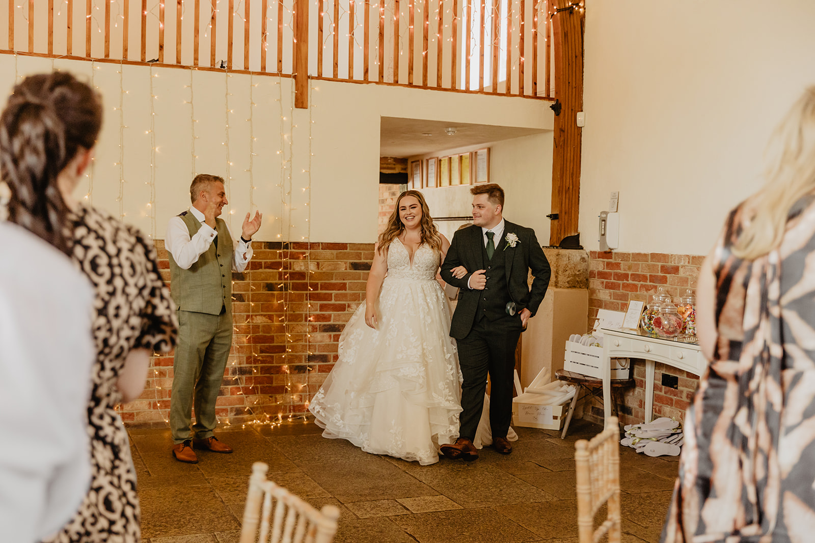 Bride and Groom at their reception at a Long Furlong Barn Wedding in Worthing, Sussex. By Olive Joy Photography.