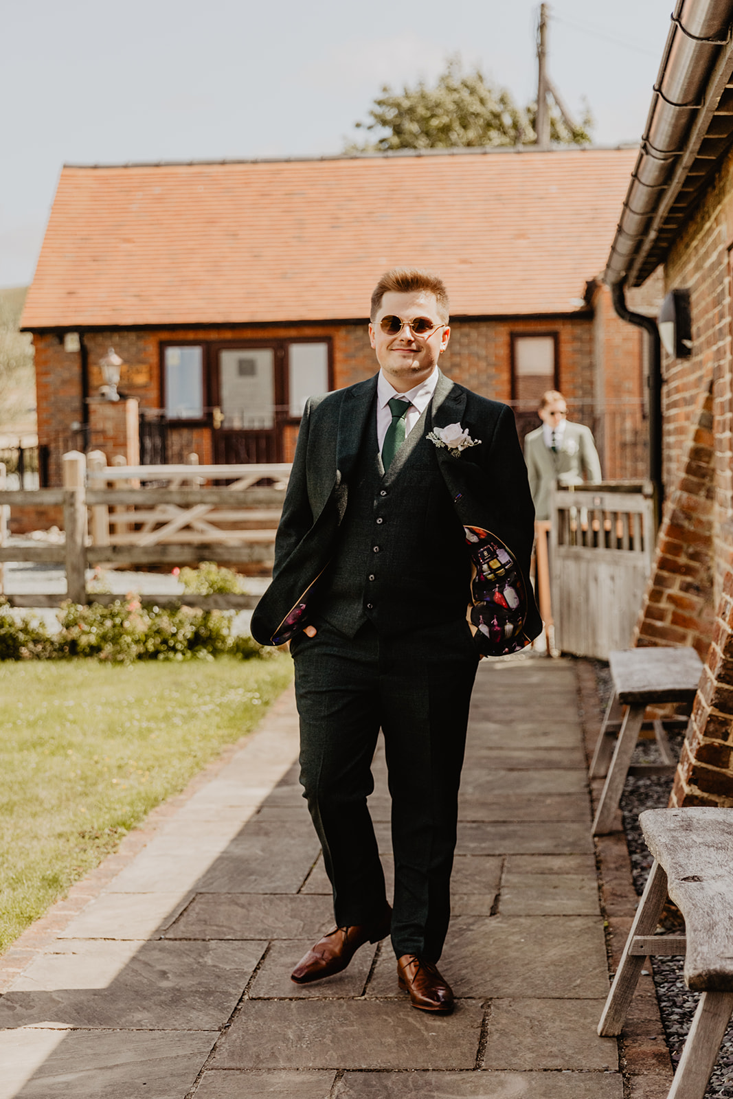 Groom as he arrives at a Long Furlong Barn Wedding in Worthing, Sussex. By Olive Joy Photography.