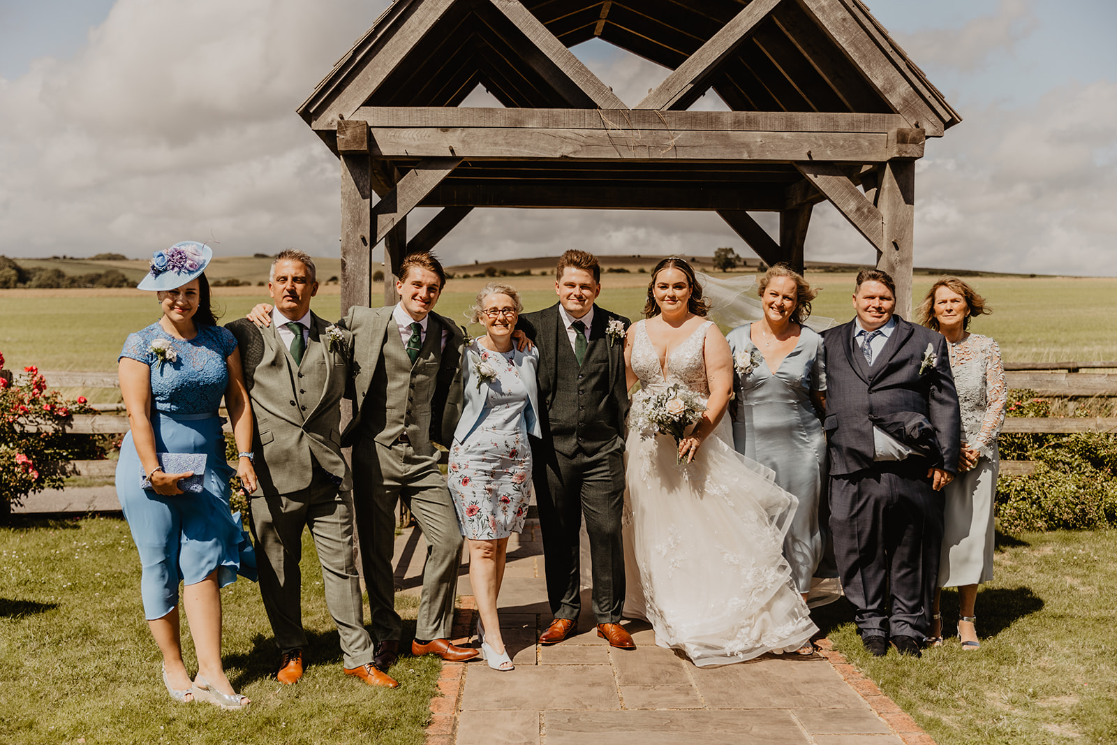 Group photos of wedding party at a Long Furlong Barn Wedding in Worthing, Sussex. By Olive Joy Photography.