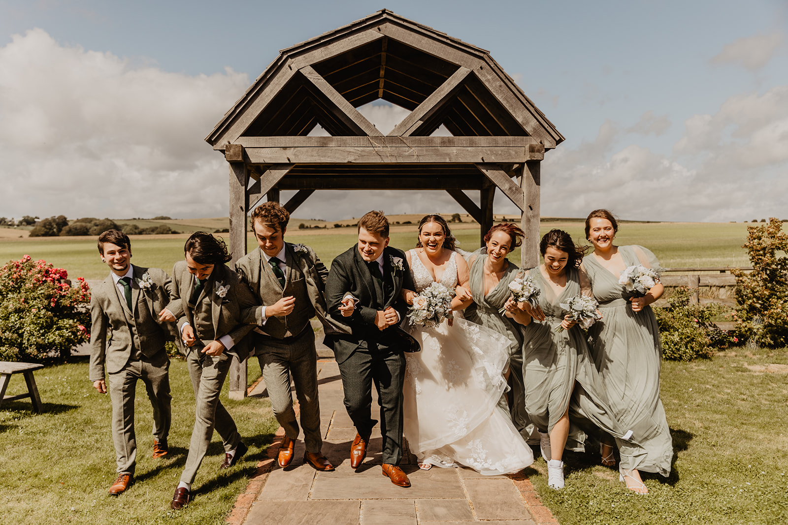 Group photos of wedding party at a Long Furlong Barn Wedding in Worthing, Sussex. By Olive Joy Photography.