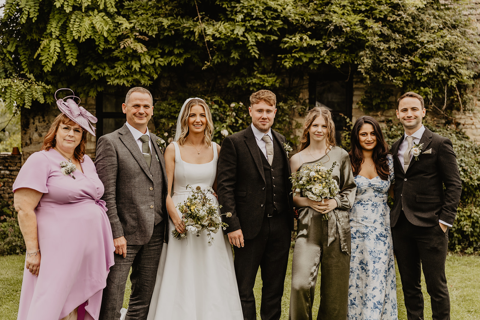 Bridal party at a Great Tythe Barn Wedding, Cotswolds. By Olive Joy Photography.