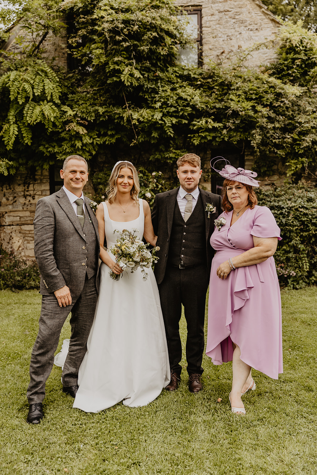 Bridal party at a Great Tythe Barn Wedding, Cotswolds. By Olive Joy Photography.