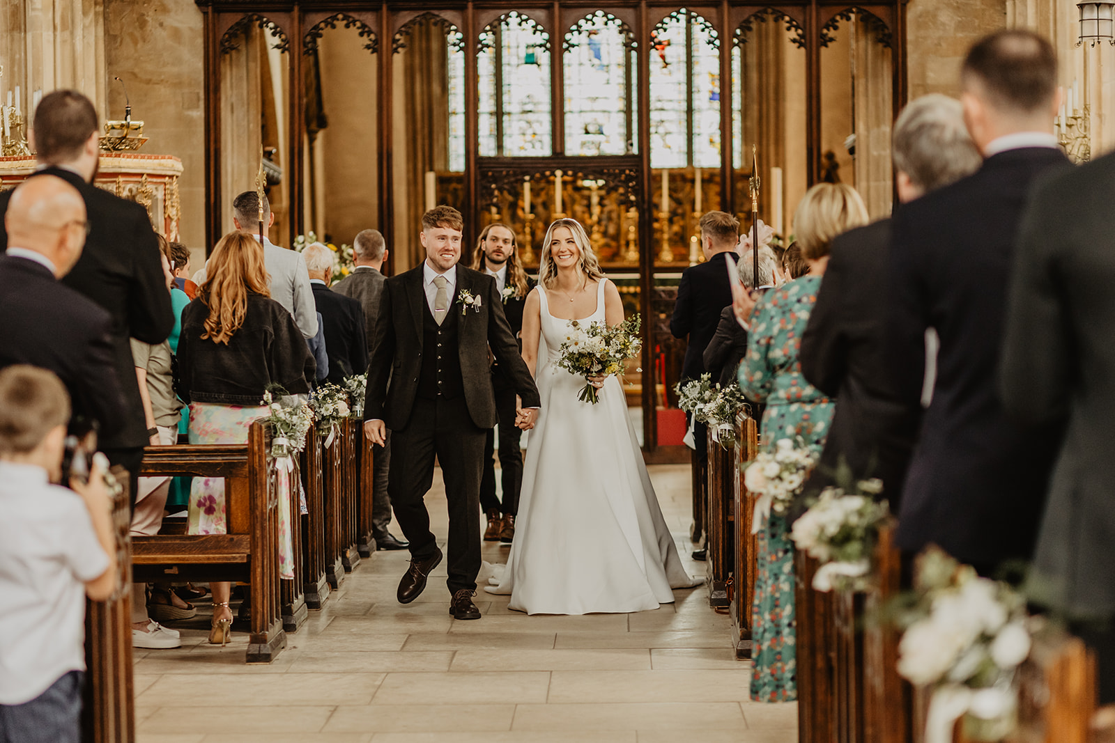 Bride and groom at a Great Tythe Barn Wedding, Cotswolds. By Olive Joy Photography.