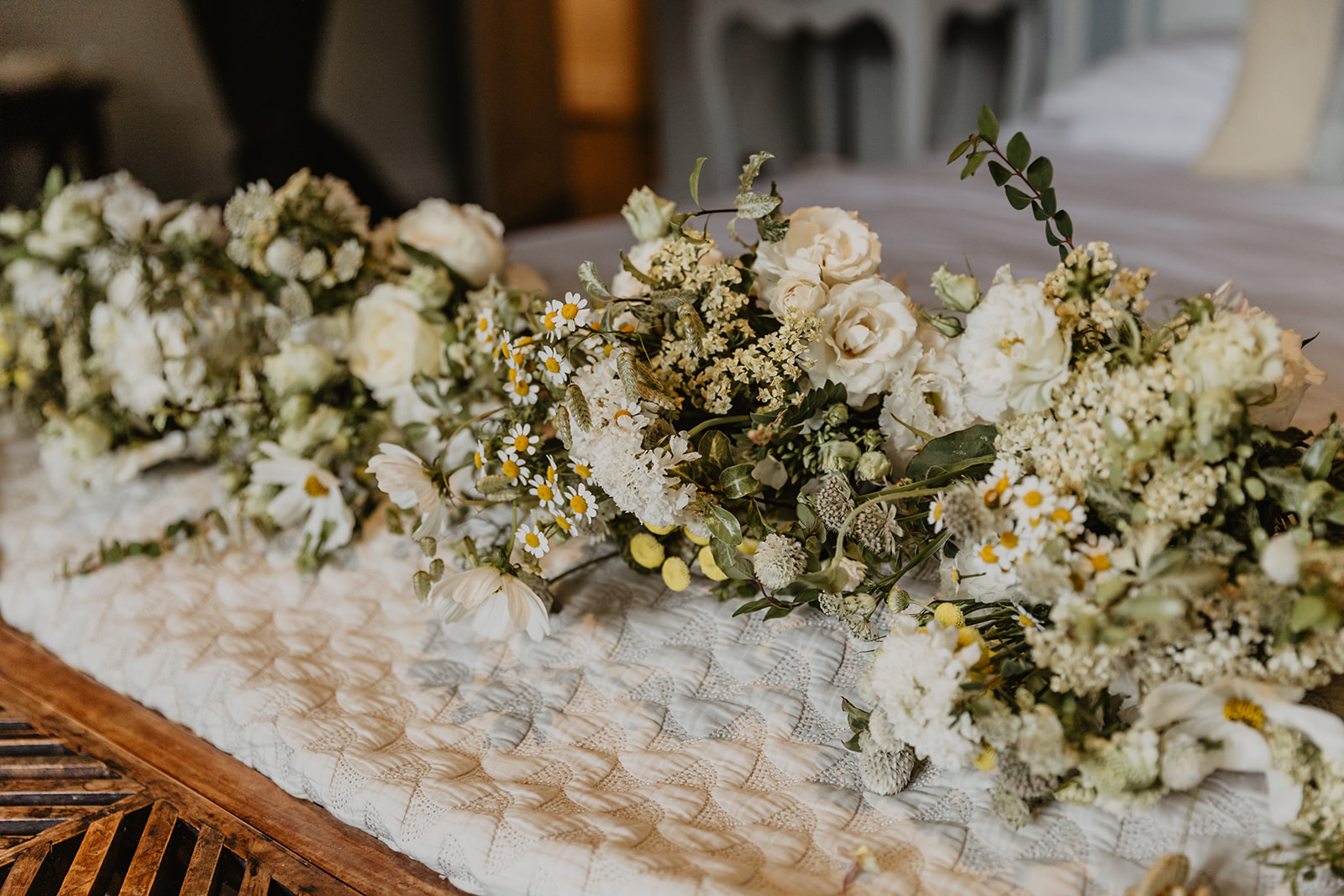 Flower arrangements at a Great Tythe Barn Wedding, Cotswolds. By Olive Joy Photography.