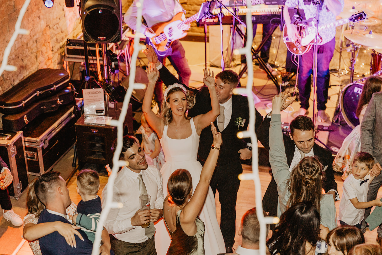 Wedding dancing at a Great Tythe Barn Wedding, Cotswolds. By Olive Joy Photography.