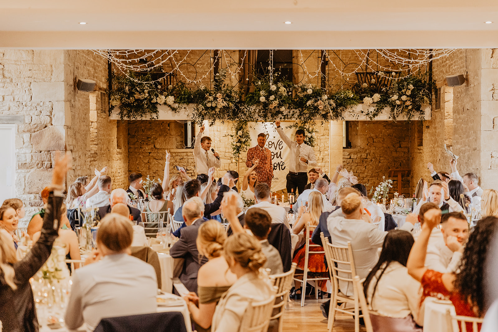 Wedding speeches at a Great Tythe Barn Wedding, Cotswolds. By Olive Joy Photography.