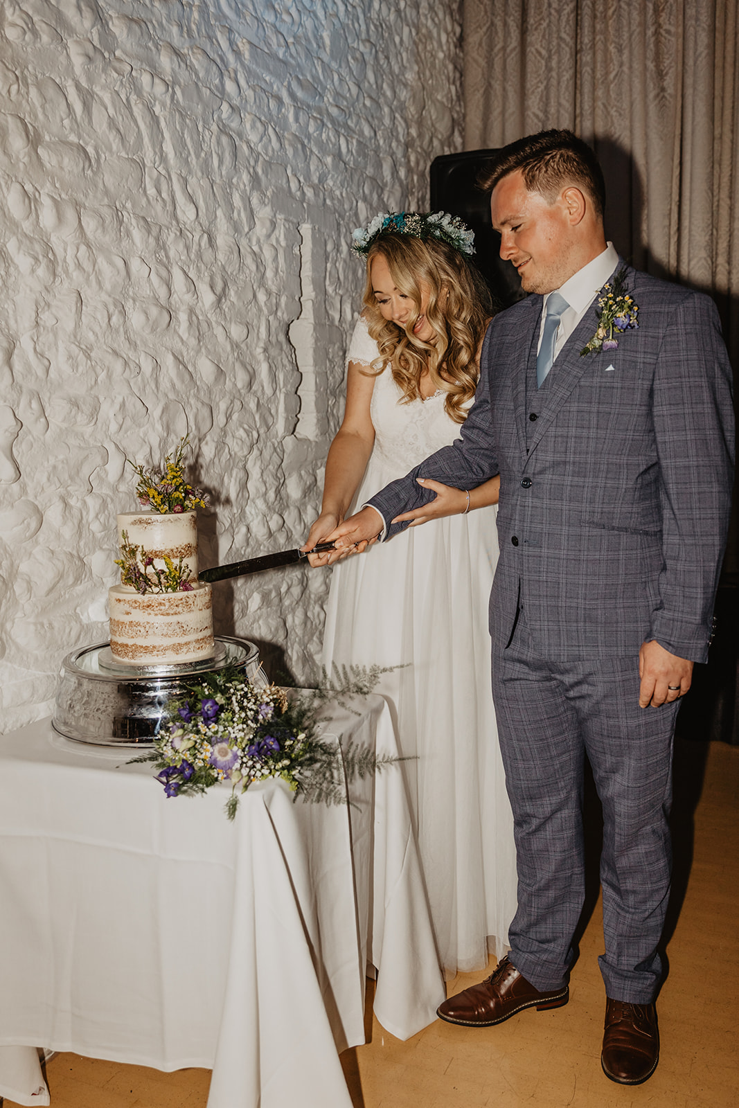Bride and groom cutting their cake at Field Place Wedding Worthing, Sussex. By OliveJoy Photography.