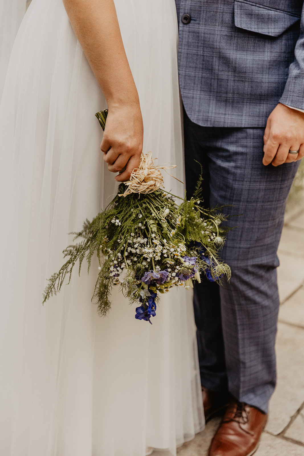 Bride and groom holding bouquet at Field Place Wedding Worthing, Sussex. By OliveJoy Photography.