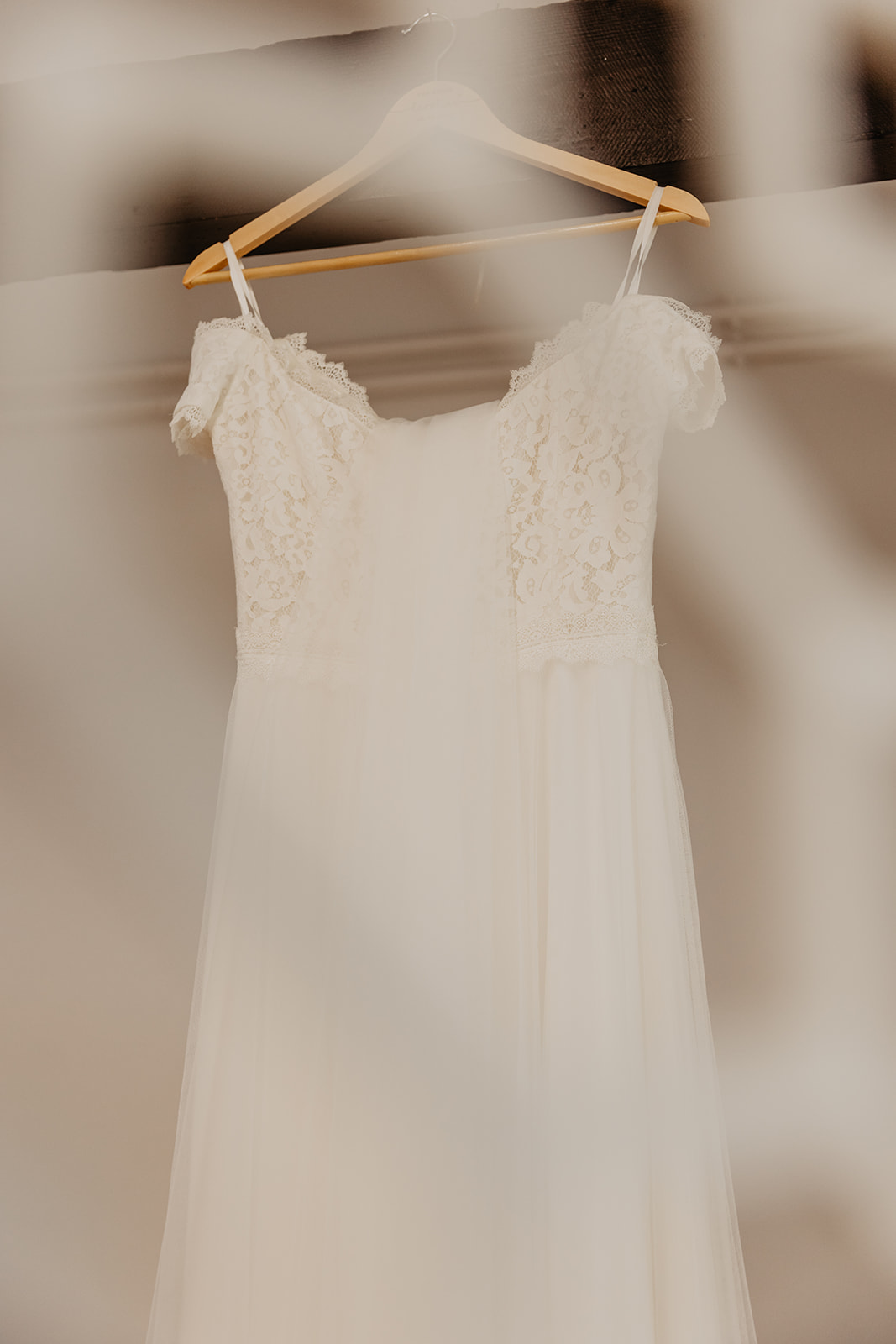 Hanging wedding dress at Field Place Wedding Worthing, Sussex. By OliveJoy Photography.