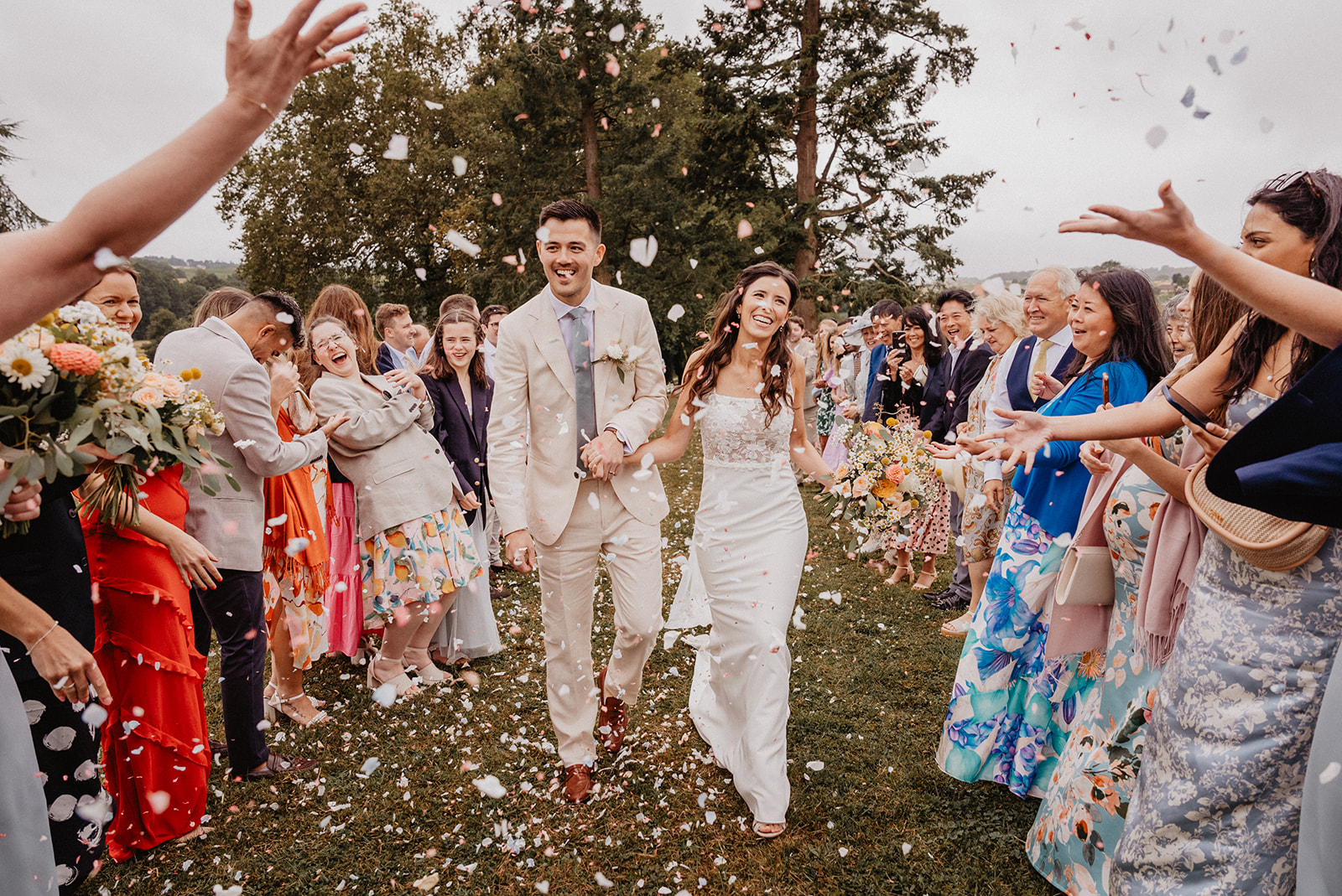 The confetti line of an english couple who gets married in france at the chateau de lerse