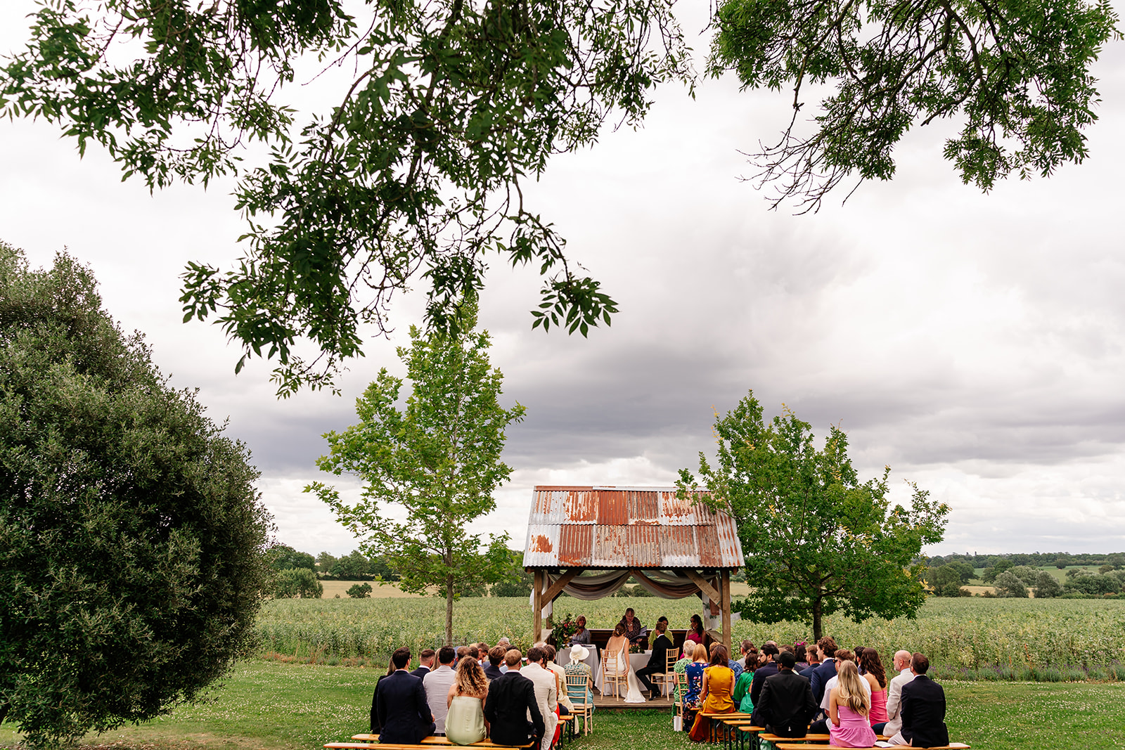 Wide photo of outdoor ceremony at Huntsmill farm 