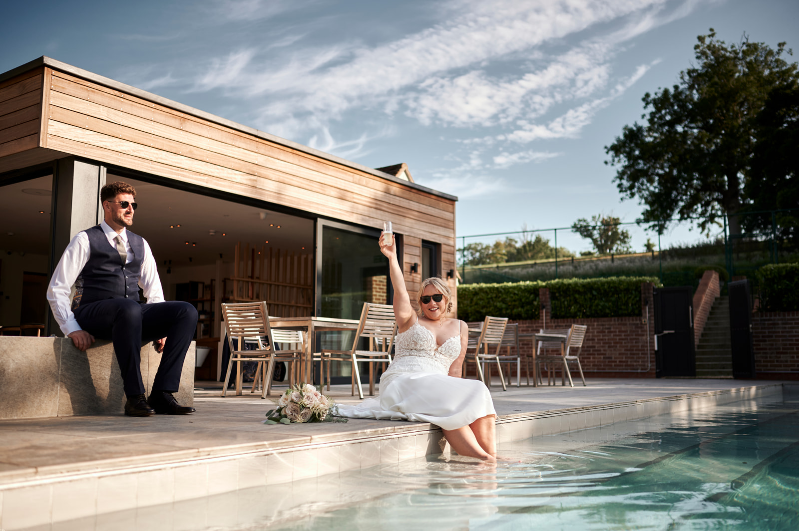 Talbooth House & Spa Wedding - Rachel Reeve Photography Veil Couple Golden Hour by Pool