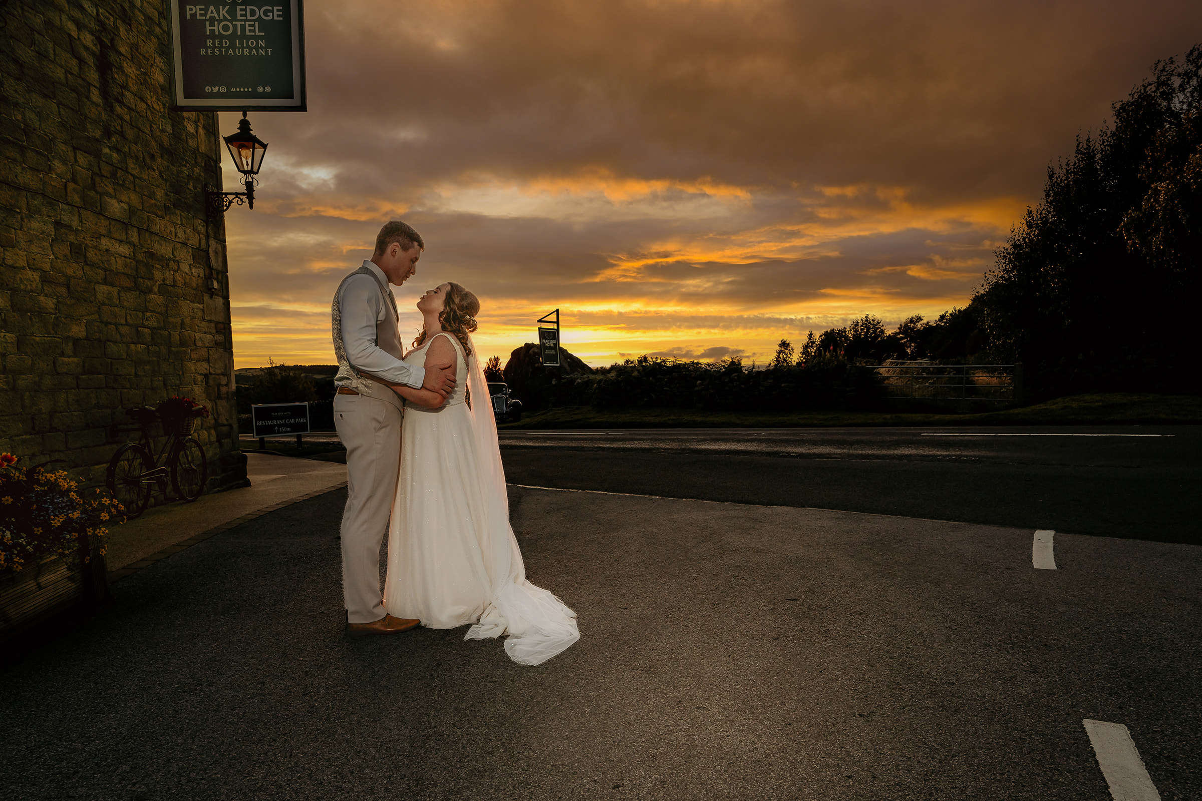 Bride and groom sunset peak edge hotel