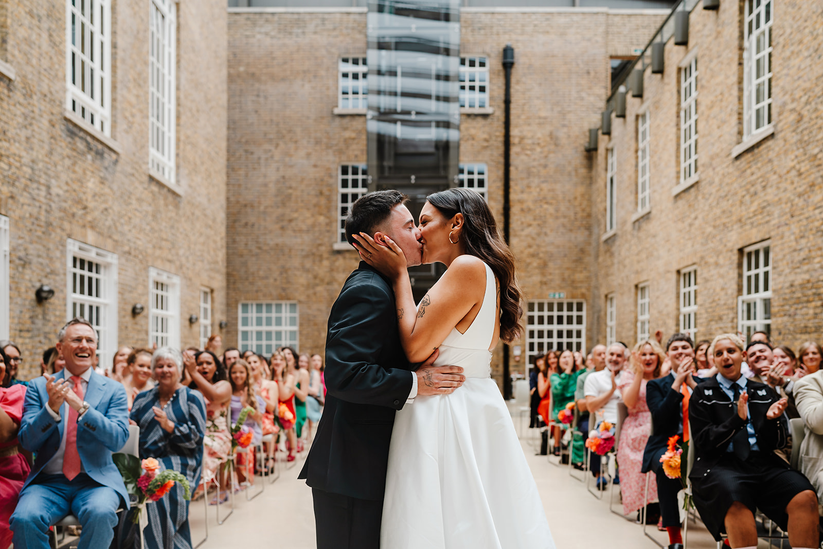 LGBTQ wedding at Hackney Town Hall with colourful, bold florals