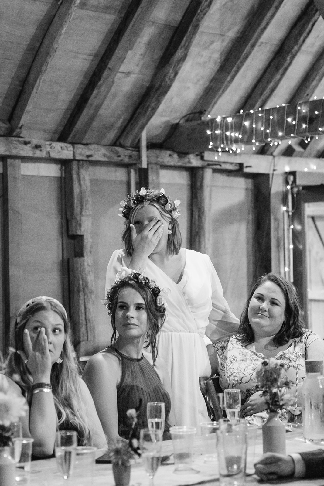 Bride during speeches at a wedding at Gilbert White's Hampshire. By OliveJoy Photography.