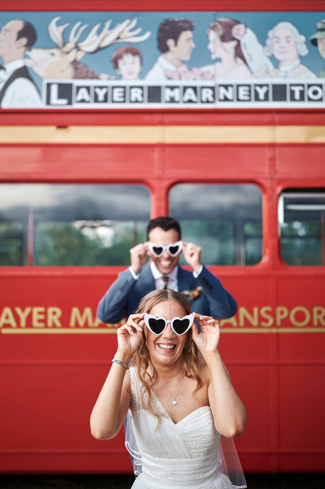 Layer Marney Tower Wedding - Rachel Reeve Photography - Couple & Routemaster Bus