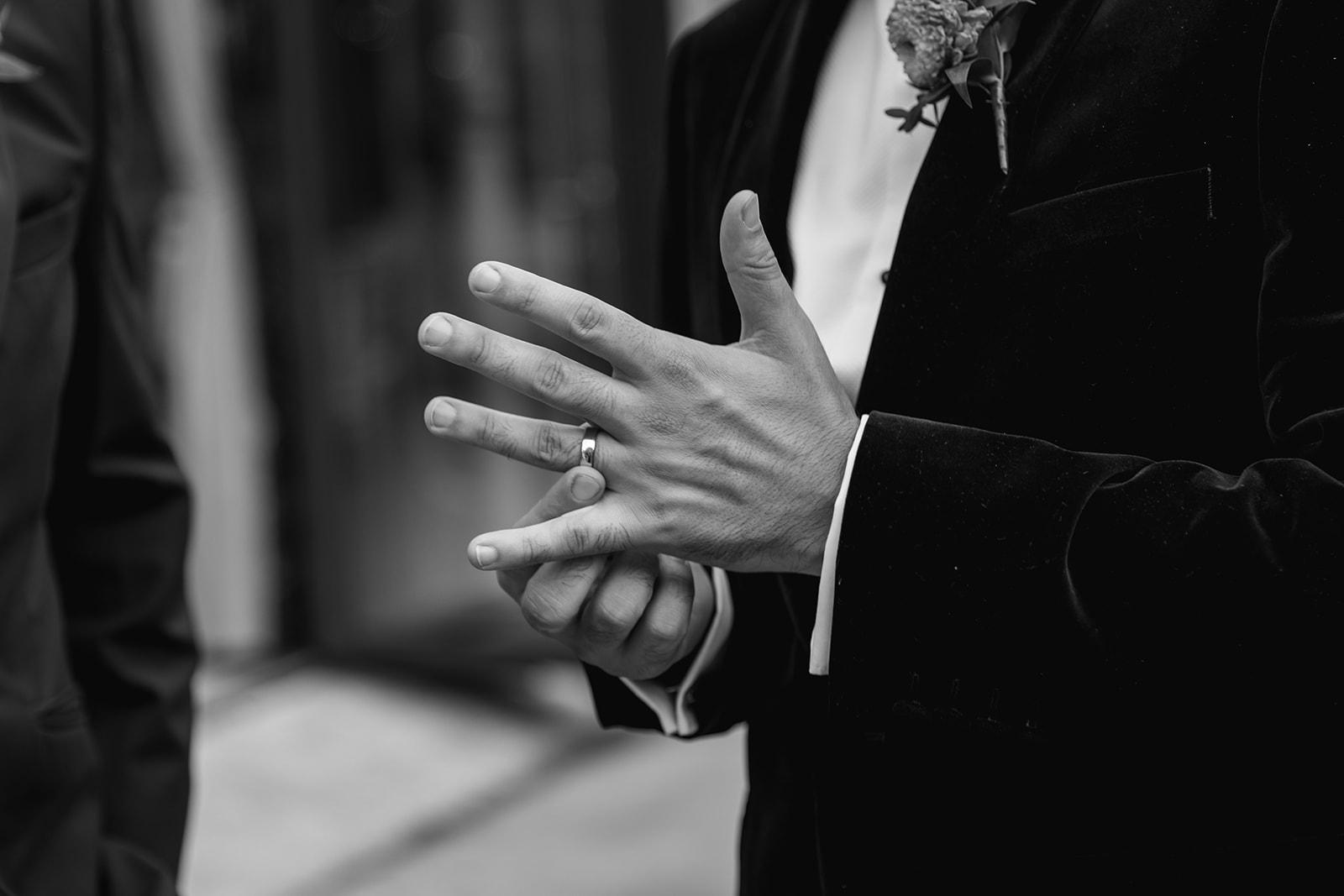 Groom playing with his wedding ring at a Southlands barn wedding, Sussex. Photo by OliveJoy Photography.