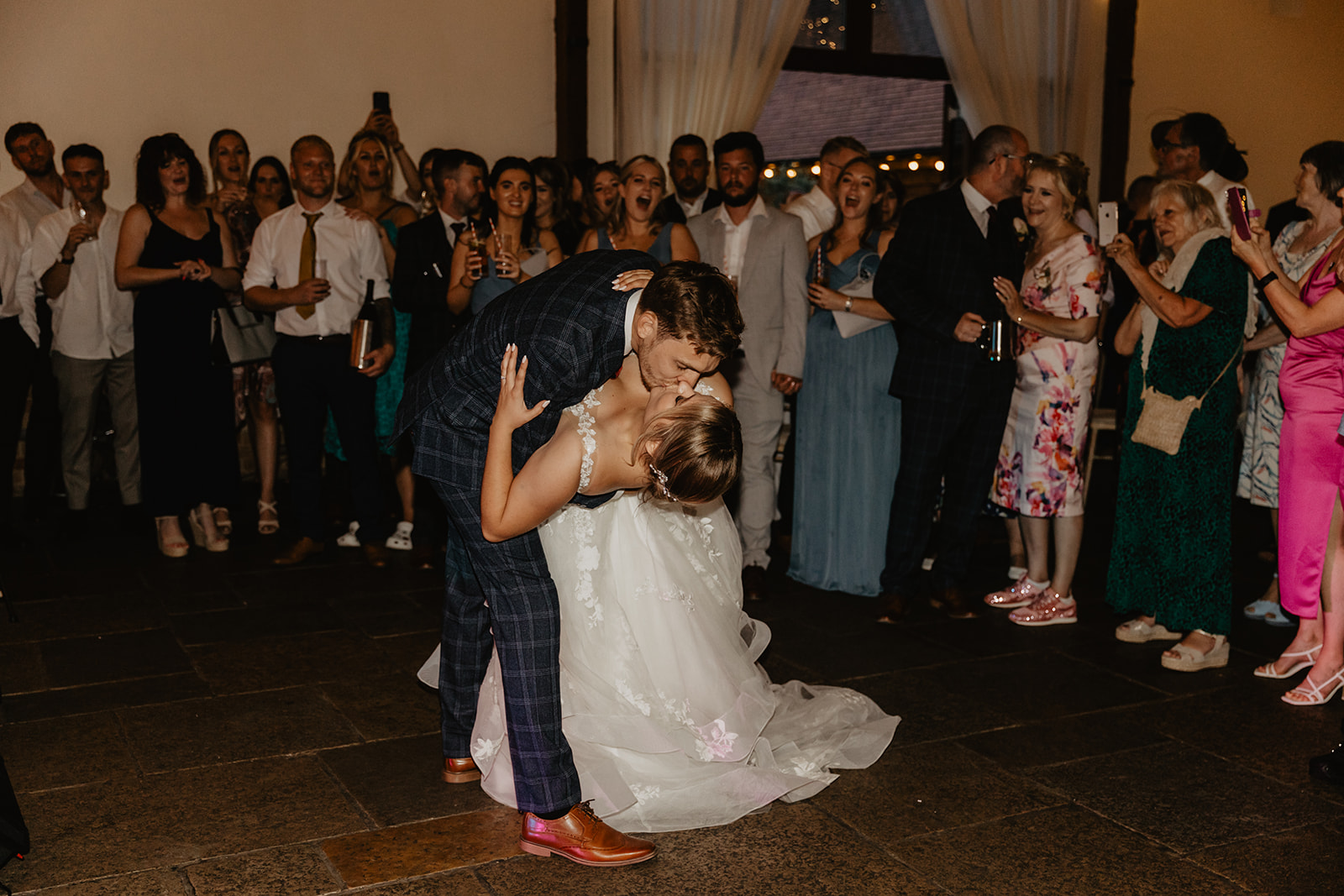 Bride and groom share a first dance at a wedding at Long Furlong Barn, Sussex. By OliveJoy Photography