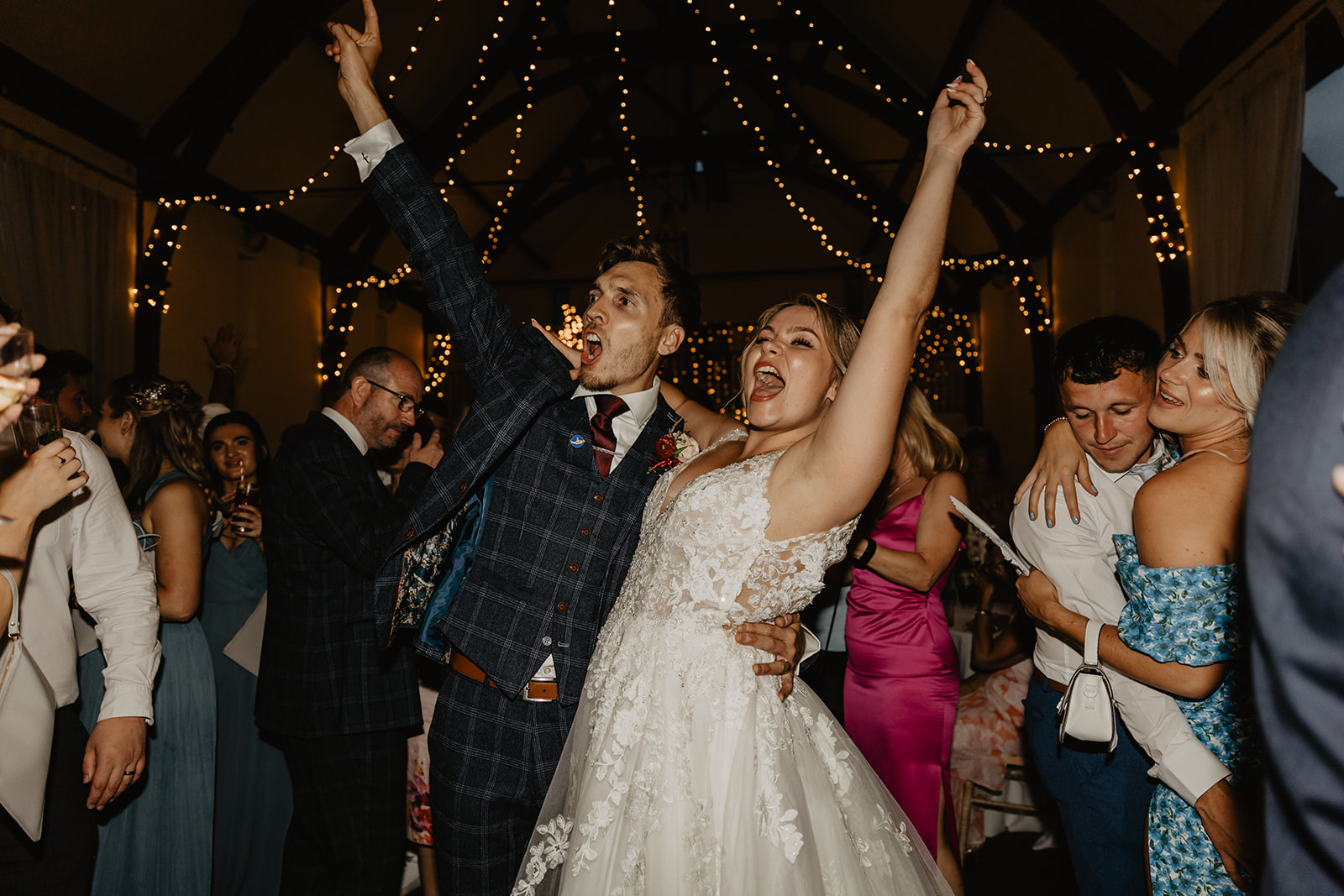 Bride and groom share a first dance at a wedding at Long Furlong Barn, Sussex. By OliveJoy Photography