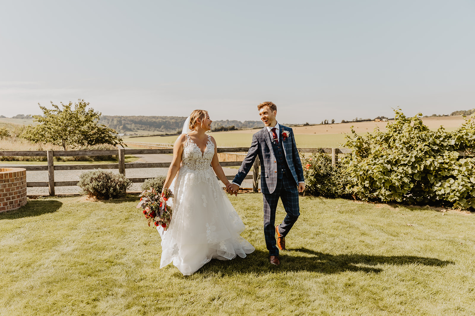 Bride and groom at a wedding at Long Furlong Barn, Sussex. By OliveJoy Photography.