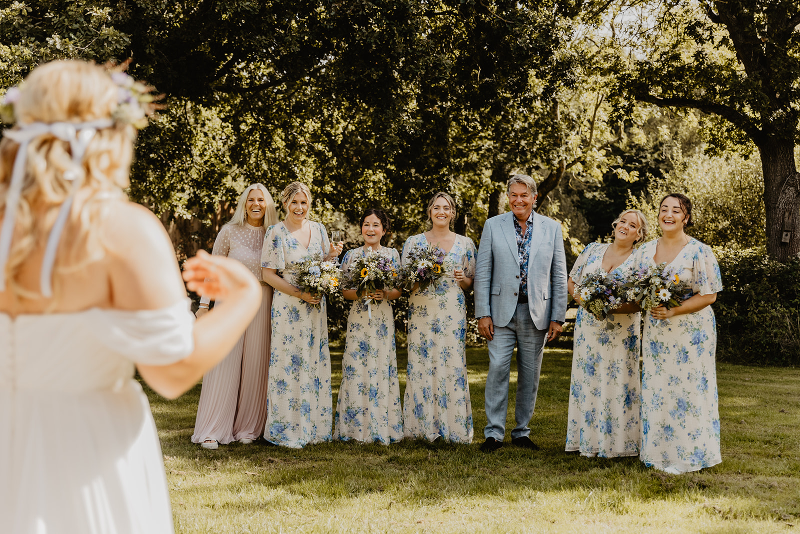 Bride and bridesmaids at a wedding at Mac's Farm in Sussex. By OliveJoy Photography.