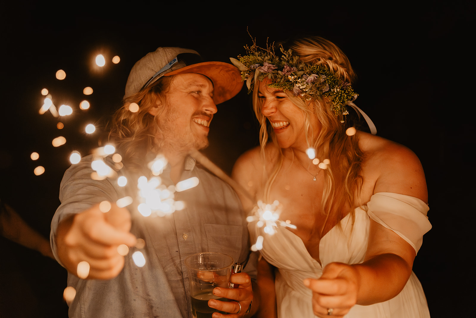 Bride and Groom sparklers at a wedding at Mac's Farm in Sussex. By OliveJoy Photography.