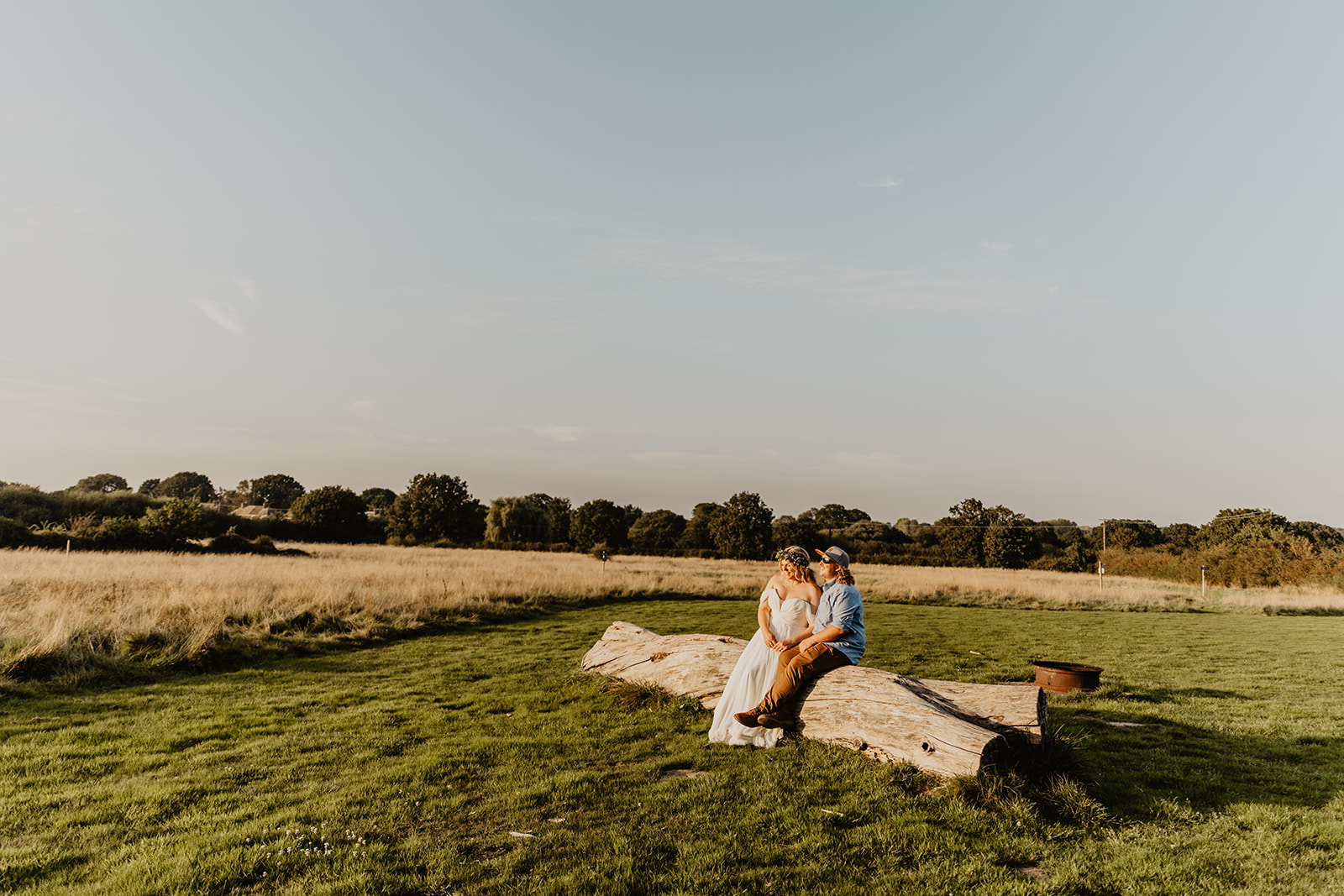 Bride and groom at sunset at a wedding at Mac's Farm in Sussex. By OliveJoy Photography.
