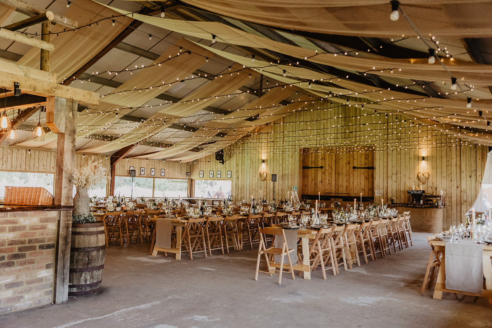 Wedding reception barn at a wedding at Mac's Farm in Sussex. By OliveJoy Photography.