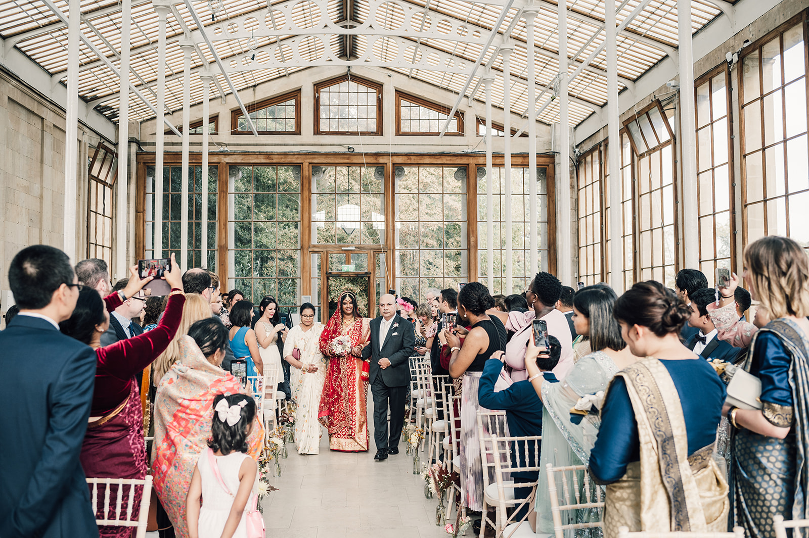 Bride enters the Nash Conservatory at Kew Gardens Wedding