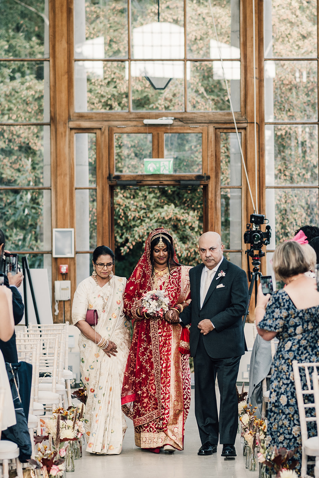 Bride with her parents in the Nash Conservatory at Kew Gardens Wedding