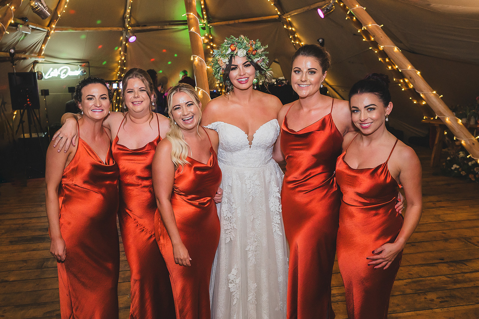 bride with bridesmaids at whatton house tipi wedding