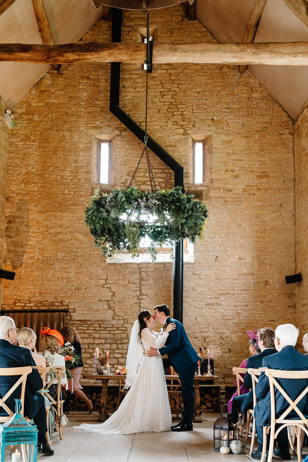 first kiss during ceremony at Yard Space, Cotswolds