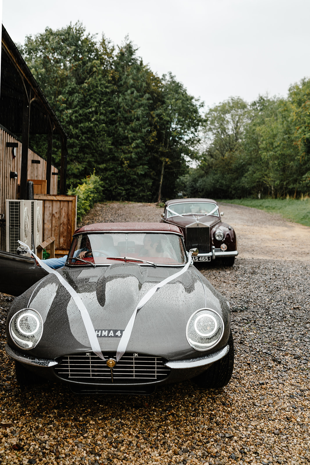 wedding cars arriving at Yard Space Old Gore wedding venue in the Cotswolds