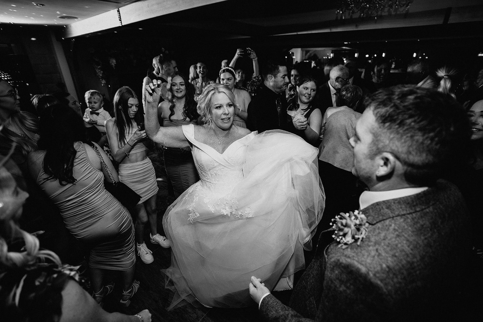black and white bride dancing