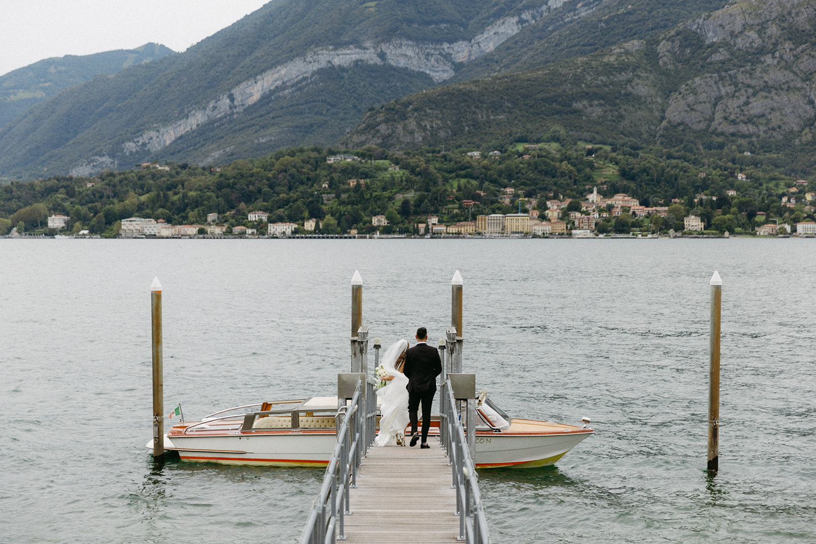 bride and groom boat ride lake como