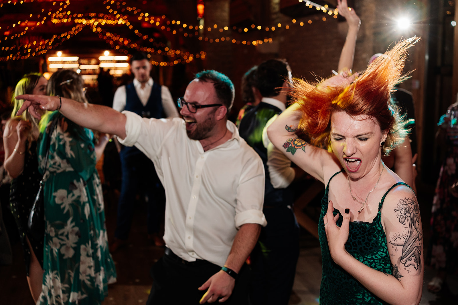 Crazy dance floor photo of wedding guests 