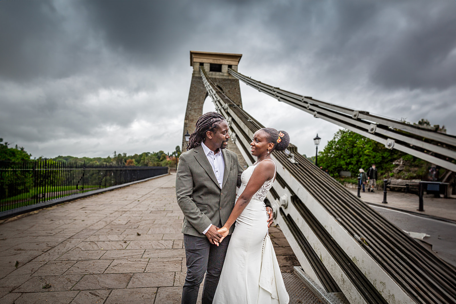 Bride and groom photographed on Clifton Suspension Bridge.