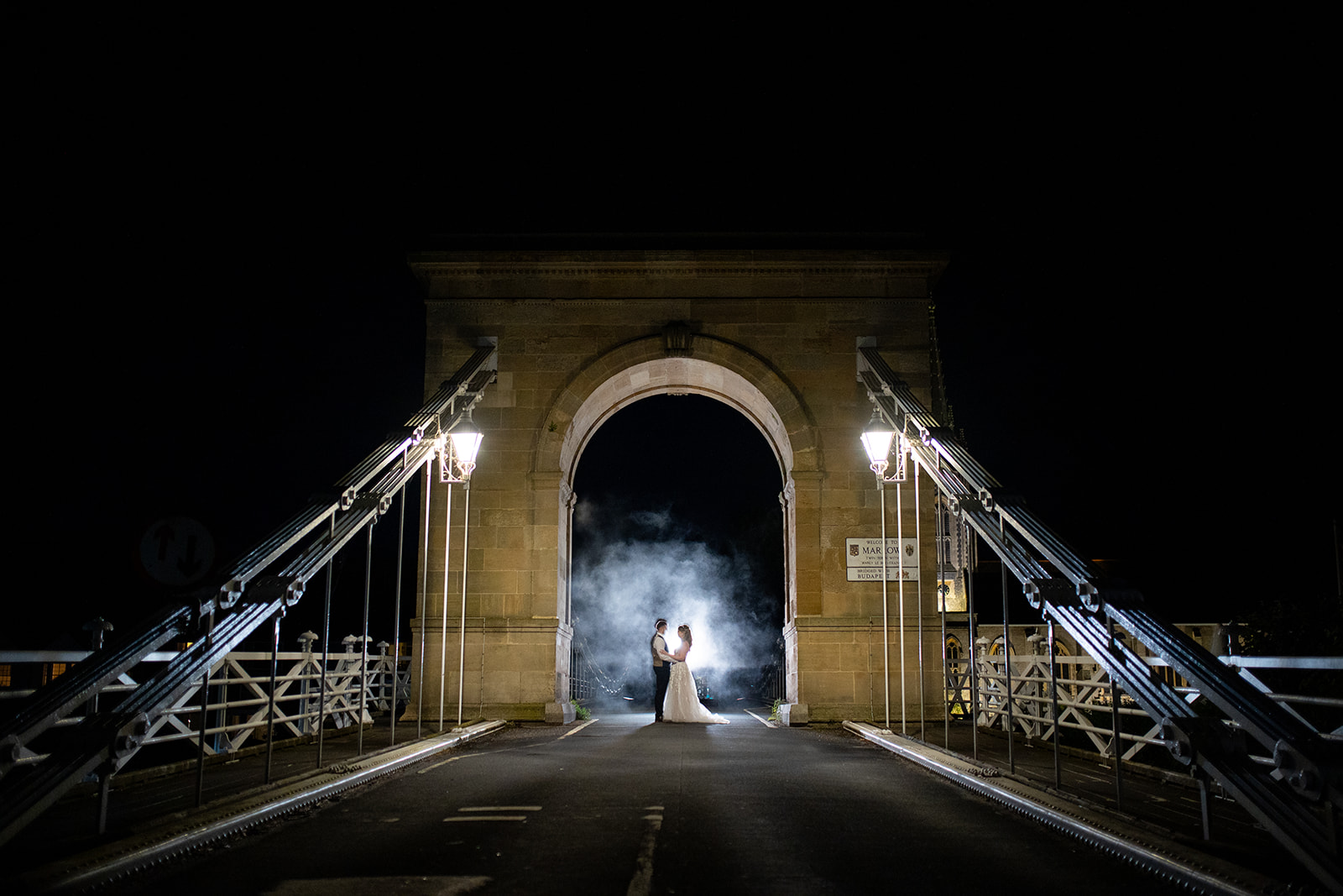 bride & groom wedding day creative portrait on marlow bridge buckinghamshire