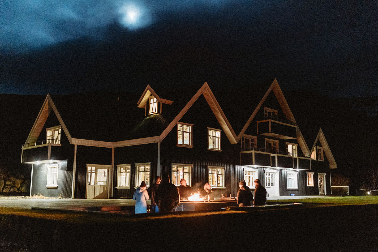 Hotel Skalakot in the dark with the moon on a Iceland Wedding day