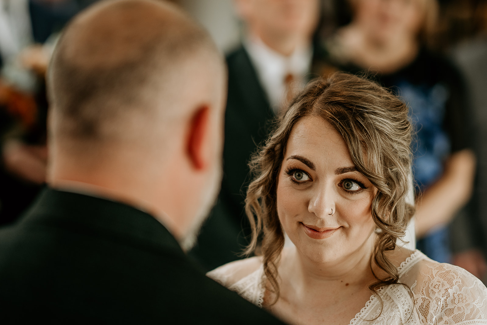 bride looking at groom