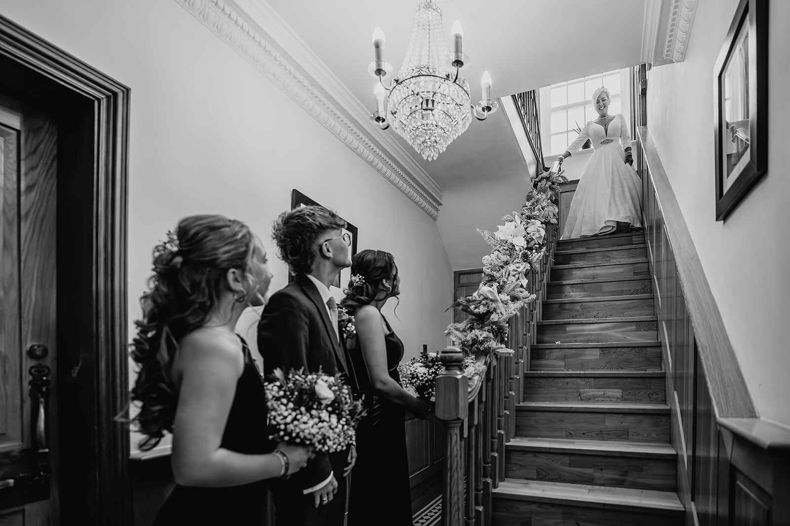 bride walking down stairs at swancar farm wedding 