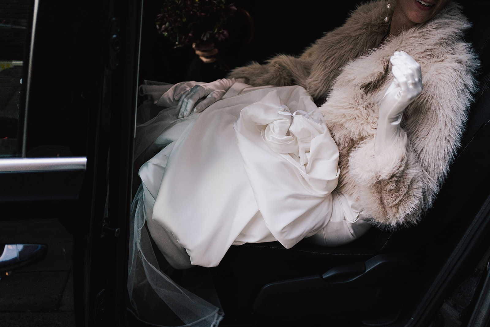Bride in Vera Wang getting into car | Modern Wedding Photography by Lisa Jane Photography