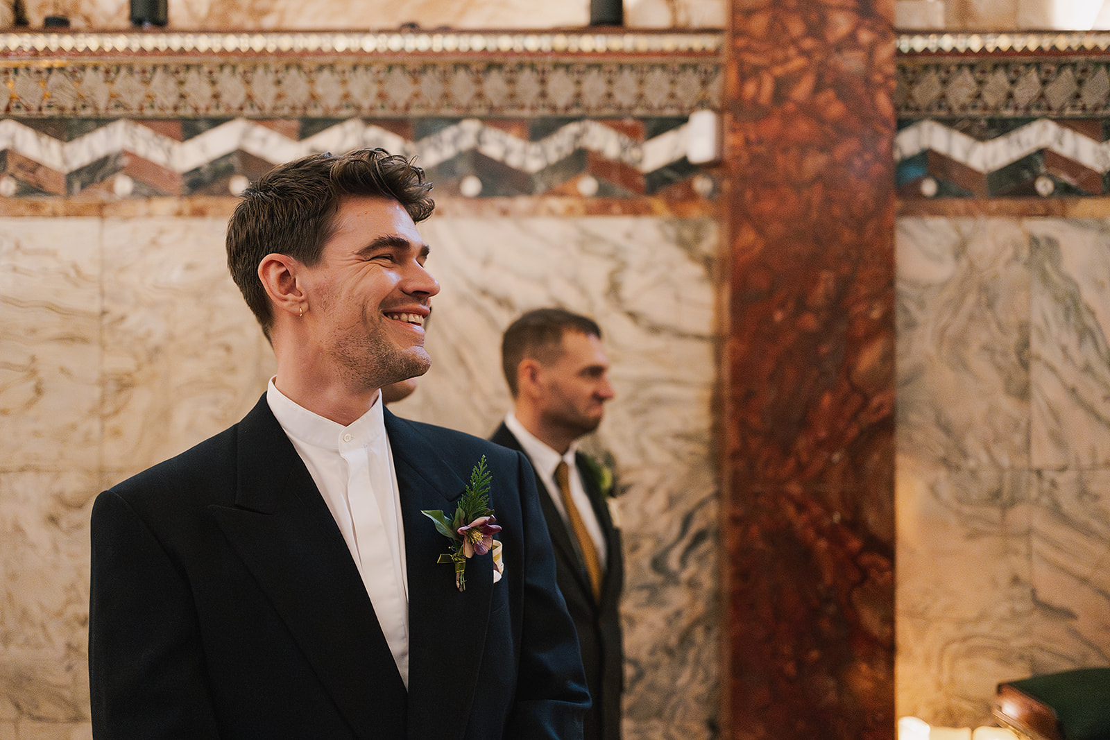 Groom waiting for bride at wedding ceremony at Fitzrovia Chapel