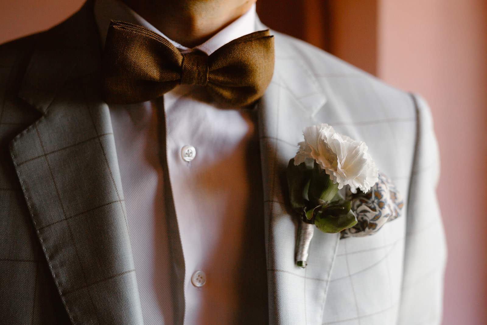 Boutonniere made with a white rose