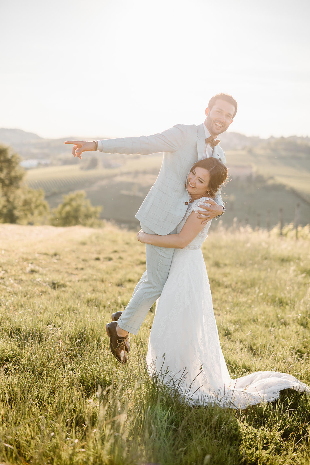 bride and groom having fun during their wedding photo shoot in Italy