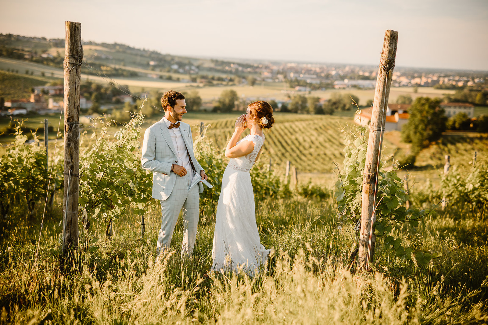bride and groom enjoying their wedding photo shoot at sunset in Italy