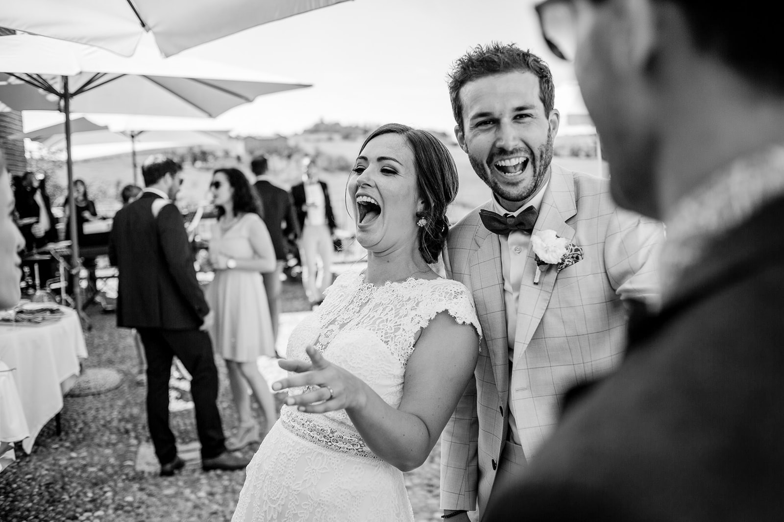 Groom and Bride having fun together during the aperitif in Monferrato