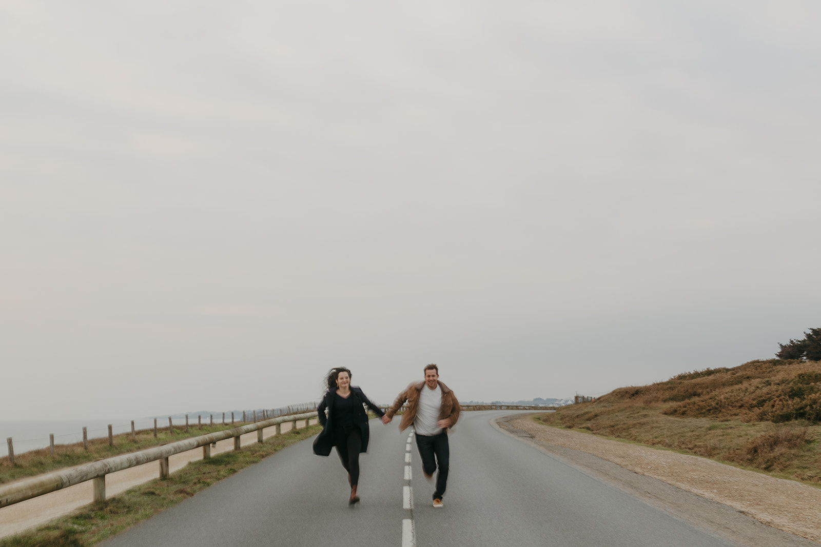 couple running on a road